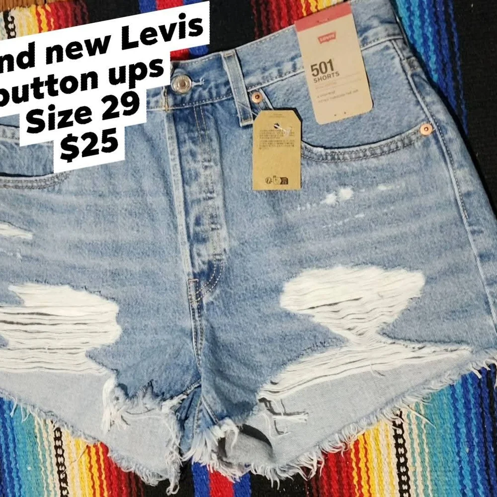 Levi's Light Blue Ripped Jean Shorts - Picture 1 of 1